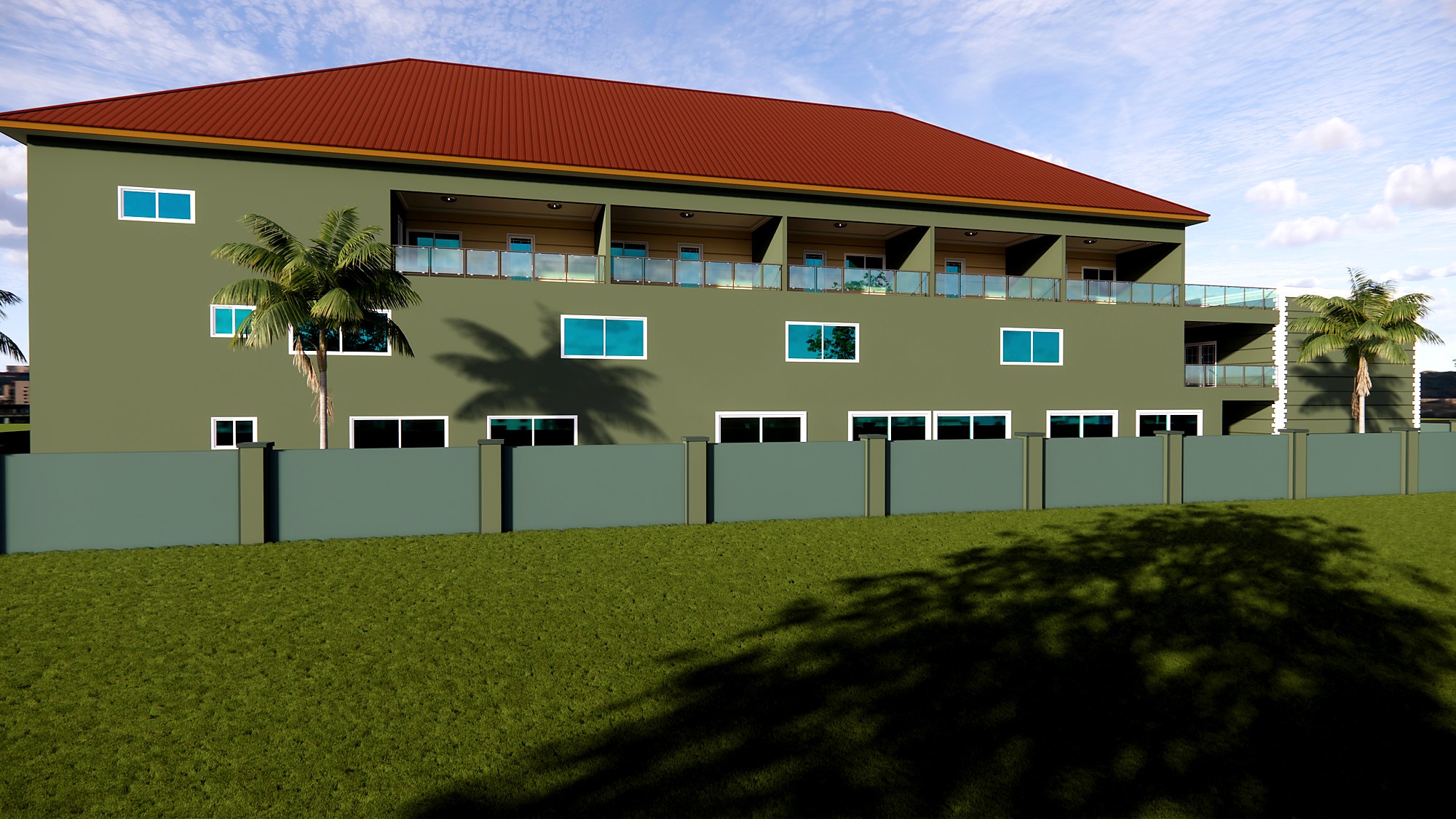 Outer elevation of the Accra Event Centre with punched windows and a shaded upper loggia behind the boundary wall